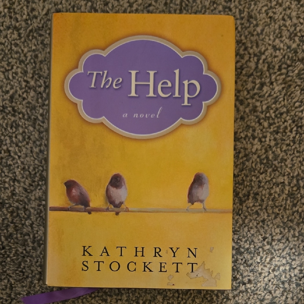 The Help Novel with Yellow and Purple Cover